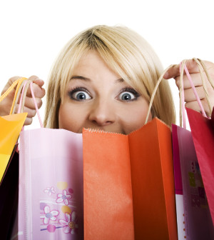 Excited Women Shopping With Shopping Bags