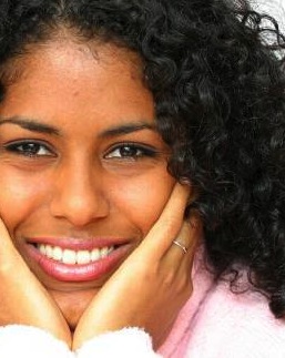 happy woman pink sweater